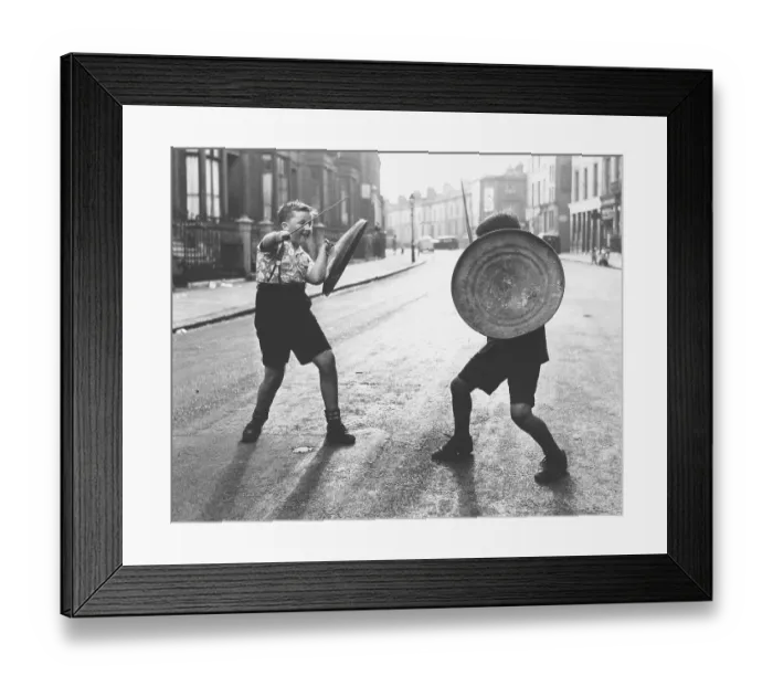 Framed Print : Children with shield and stick play knights Framed Print : Children with shield and stick play knights