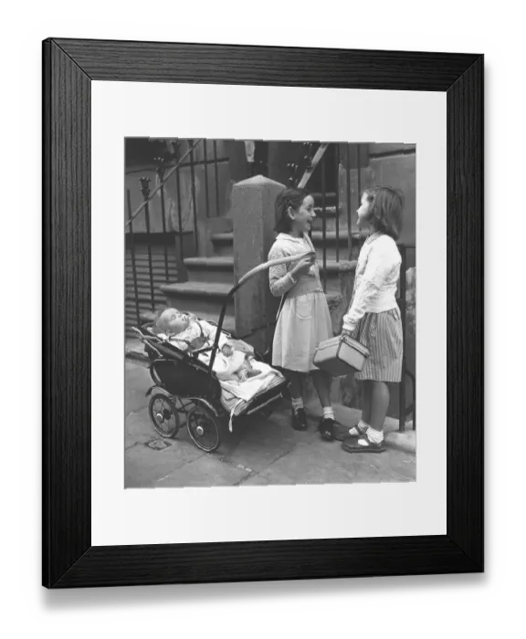Framed Print : Two girls with baby and prams, England Framed Print : Two girls with baby and prams, England