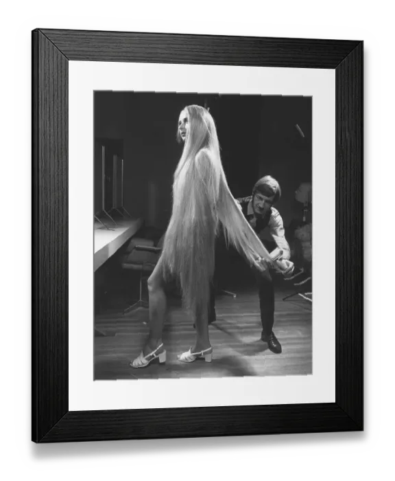 Framed Print : Woman with extremely long blonde hair