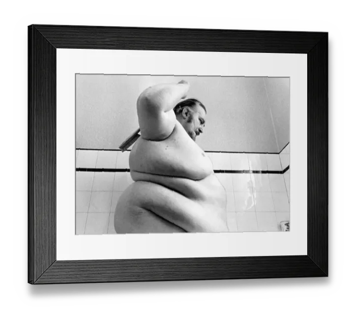 Framed Print : Big man washes himself, England, Great Britain Framed Print : Big man washes himself, England, Great Britain