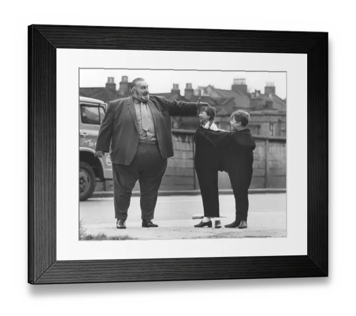 Framed Print : Big man with children, England, Great Britain Framed Print : Big man with children, England, Great Britain