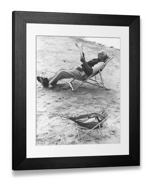 Framed Print : Parrot and man in deck chair, England