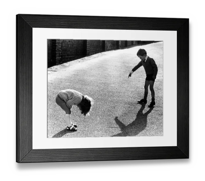 Framed Print : Brother and sister play together
