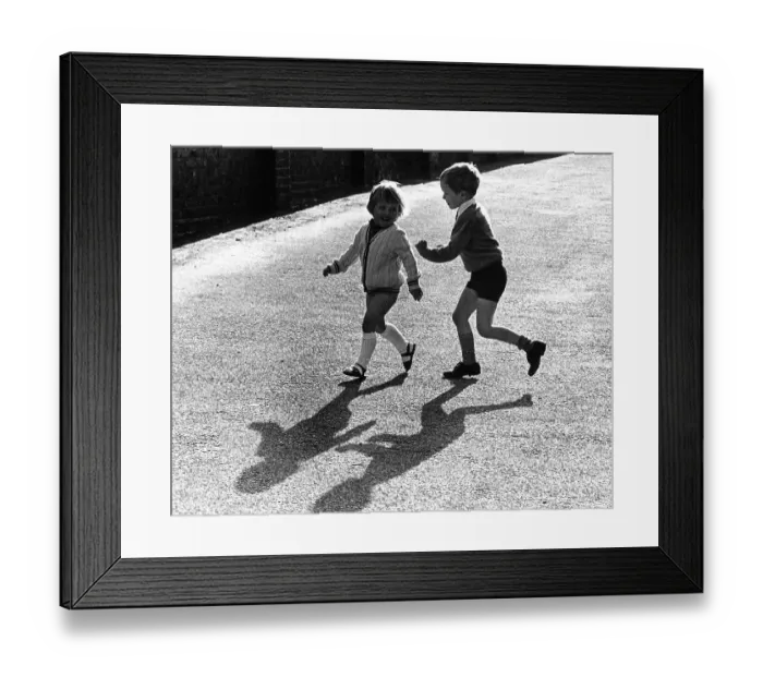 Framed Print : Brother and sister play together Framed Print : Brother and sister play together