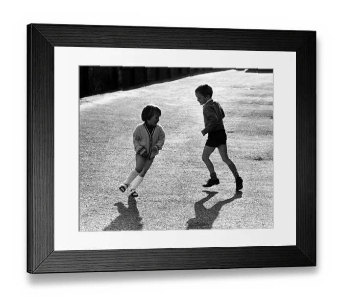 Framed Print : Brother and sister play together