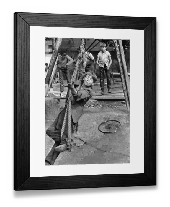 Framed Print : Boy plays and smokes, England, Great Britain
