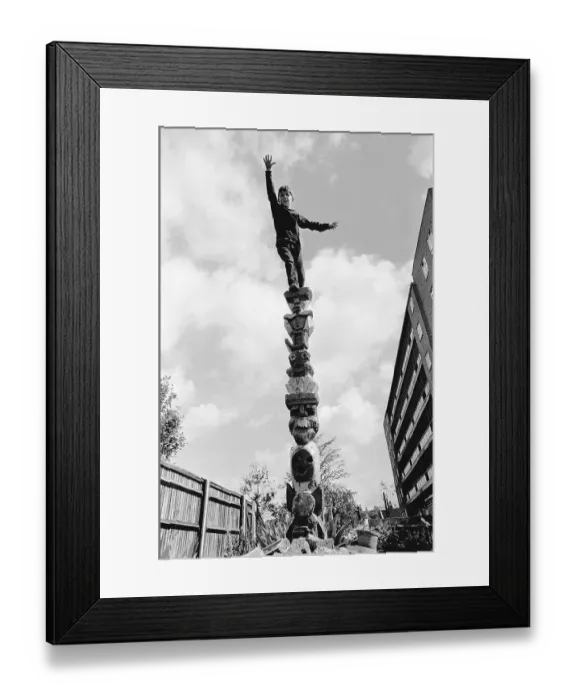 Framed Print : Boy climbs on pole, England, Great Britain