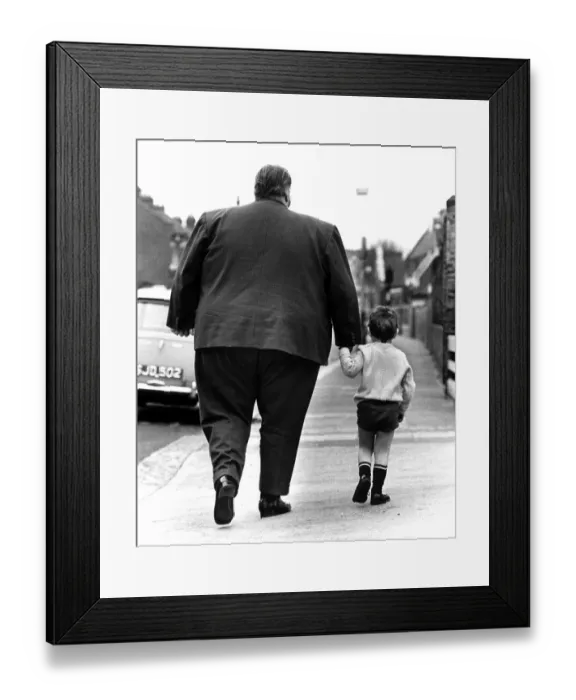 Framed Print : Big man and little boy, England, Great Britain Framed Print : Big man and little boy, England, Great Britain