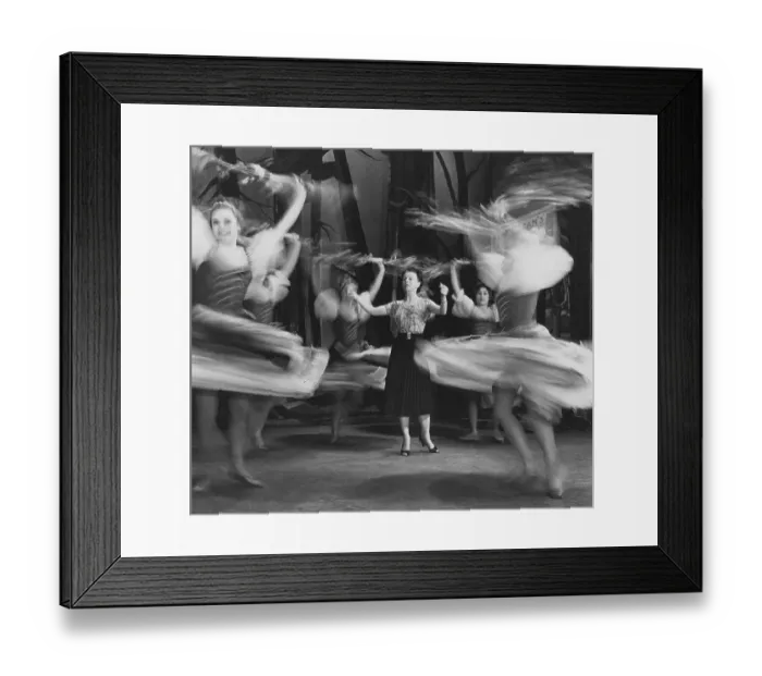 Framed Print : Woman giving lessons to female dancers