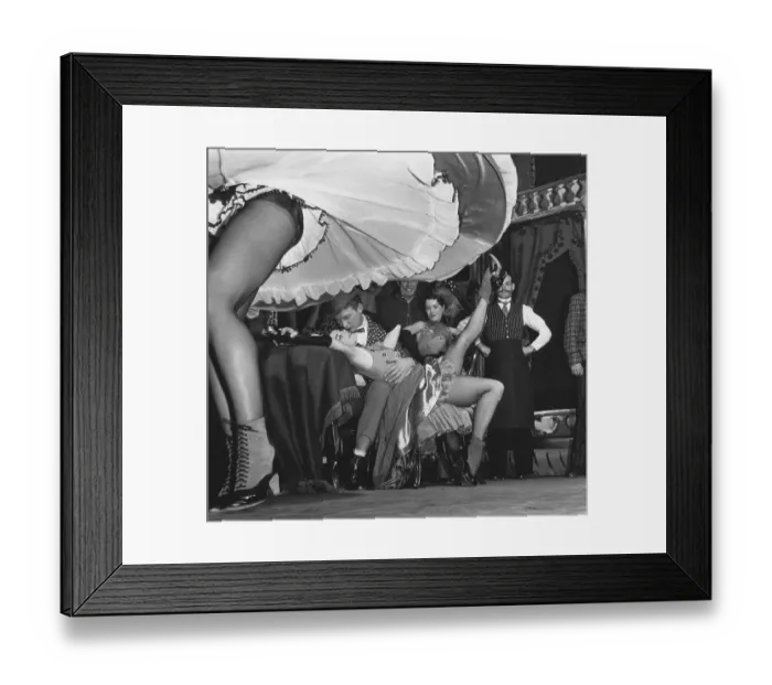 Framed Print : Kissing couple behind blowing dance skirt Framed Print : Kissing couple behind blowing dance skirt