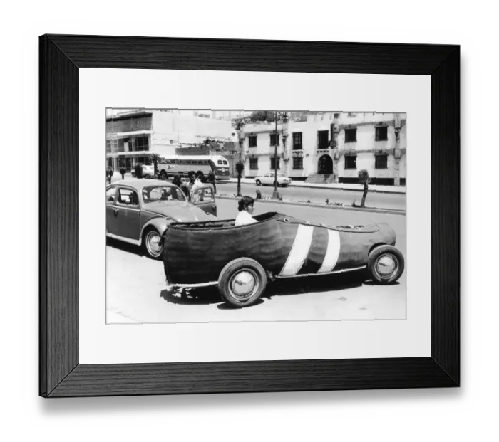 Framed Print : Man driving Car as a sneaker, Mexico City Framed Print : Man driving Car as a sneaker, Mexico City