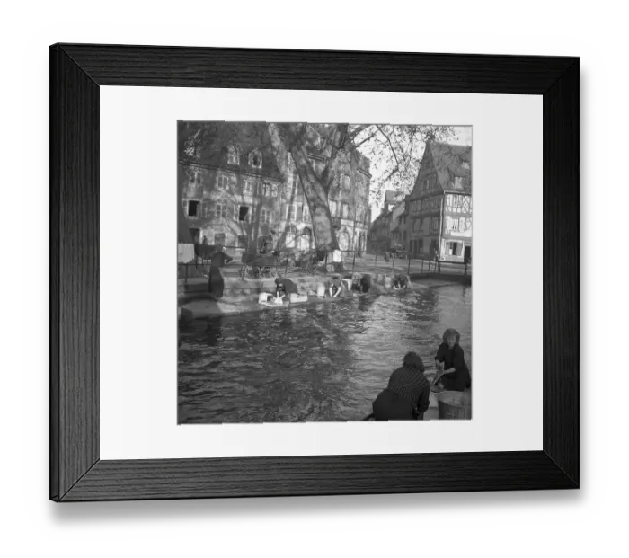 Framed Print : Housewives do their laundry on the banks of a river Framed Print : Housewives do their laundry on the banks of a river