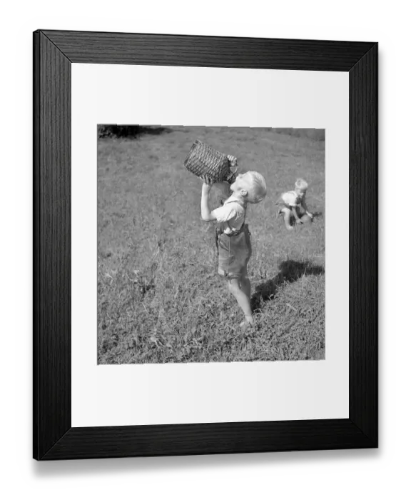Framed Print : A boy drinks from a wooden vessel, ca Framed Print : A boy drinks from a wooden vessel, ca