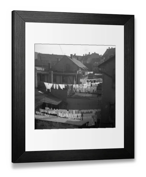 Framed Print : Clothes lines stretched between houses Framed Print : Clothes lines stretched between houses