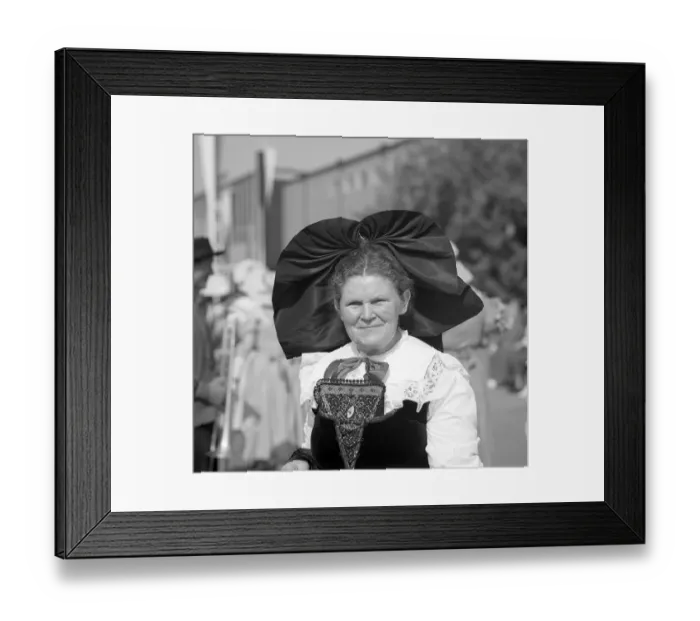 Framed Print : Elderly woman in traditional traditional costume with hair ornaments