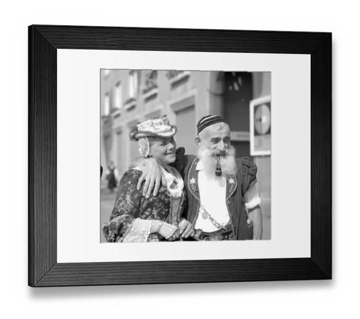 Framed Print : Woman and man dressed in traditional costumes