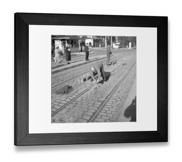 Framed Print : Construction workers paving a road around 1950