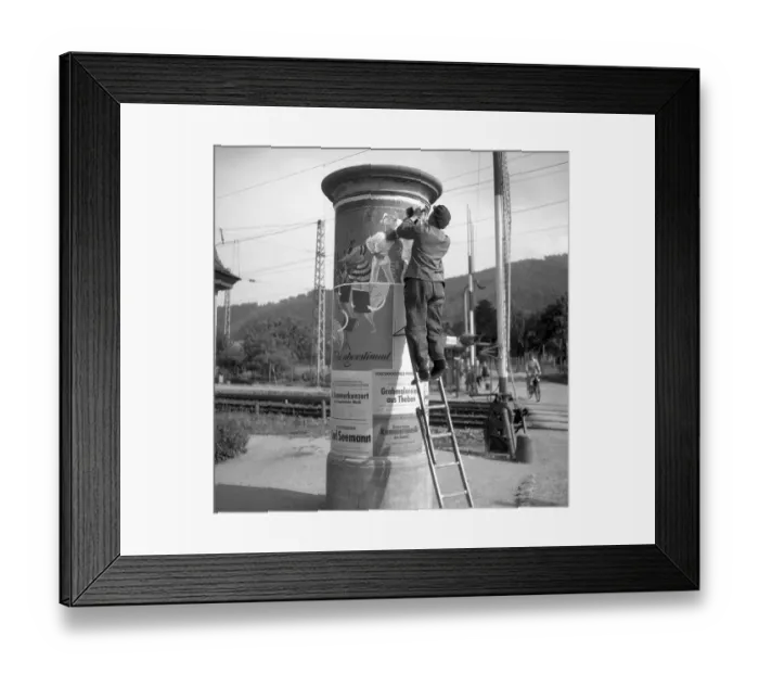 Framed Print : Advertising posters attached to advertising pillar ca Framed Print : Advertising posters attached to advertising pillar ca