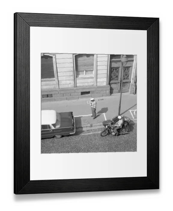 Framed Print : Two traffic policemen handing out a parking ticket to a car parker around 1950 Framed Print : Two traffic policemen handing out a parking ticket to a car parker around 1950