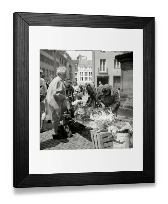 Framed Print : Elderly lady buys a bouquet of flowers