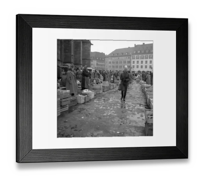 Framed Print : Rain puddles on the market place