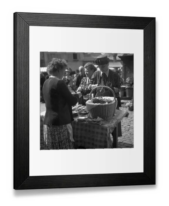 Framed Print : Woman selling pretzels at a market Framed Print : Woman selling pretzels at a market