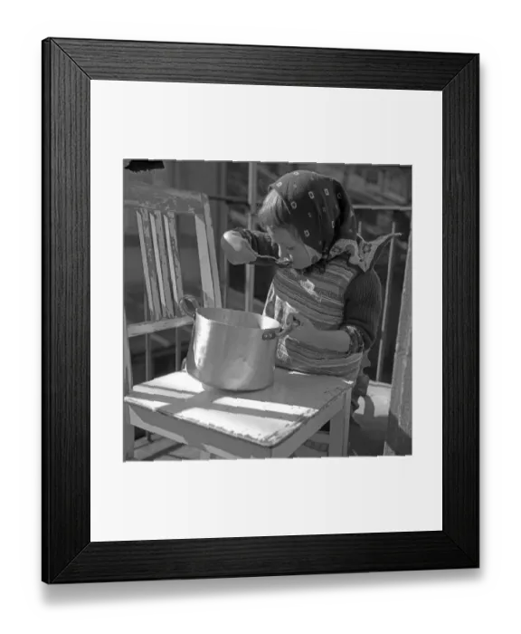 Framed Print : Child slurps out of a pot, Freiburg and surrounding area approx