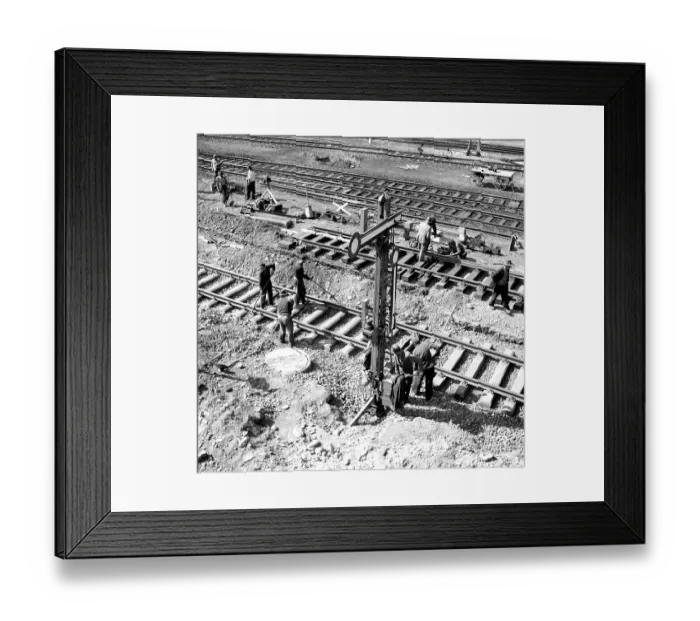 Framed Print : Construction worker, track construction