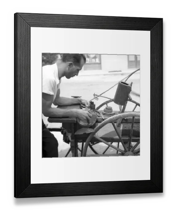 Framed Print : Scissors grinder at work, approx Framed Print : Scissors grinder at work, approx