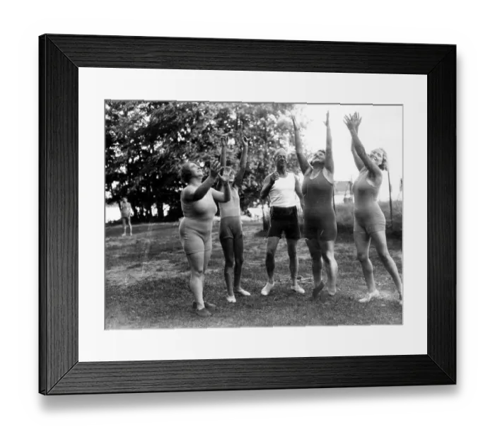 Framed Print : Women and men catch a ball, ca