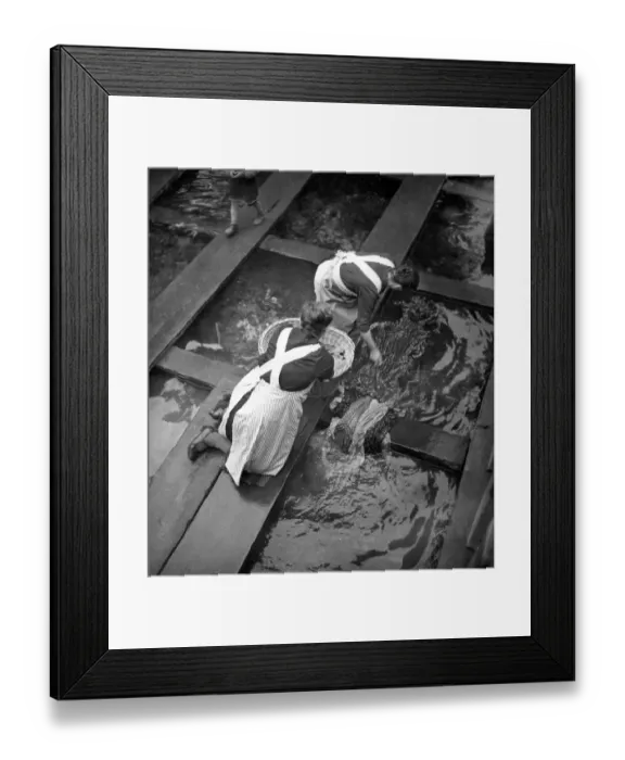 Framed Print : Laundry washing in the river ca