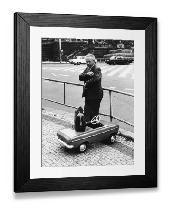 Framed Print : Man with toy car ca. 1970s, exact place unknown Framed Print : Man with toy car ca. 1970s, exact place unknown