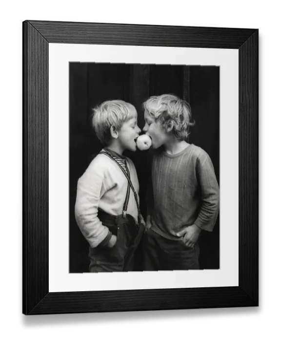 Framed Print : Two boys share an apple about 1970s