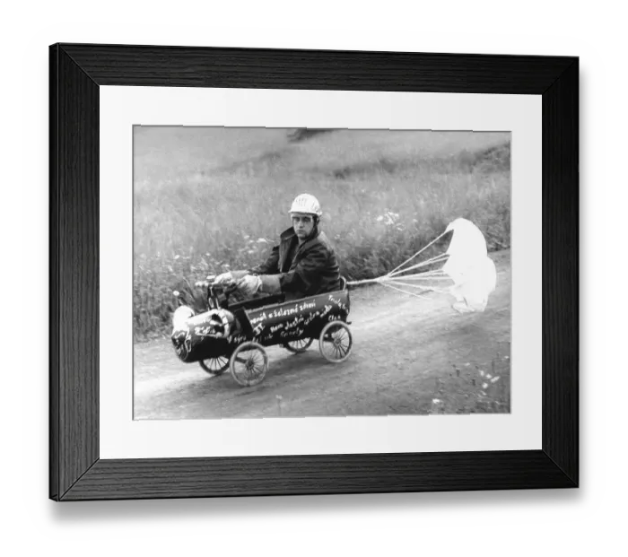 Framed Print : Man in soapbox with brake parachute ca Framed Print : Man in soapbox with brake parachute ca