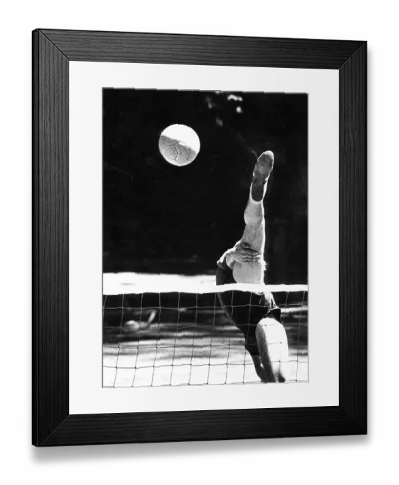 Framed Print : Balancing act at volleyball ca