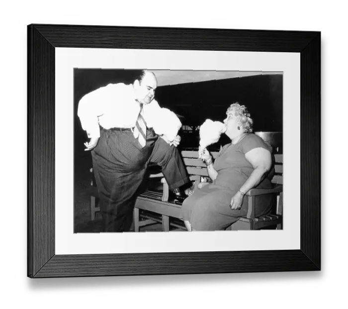 Framed Print : Thick couple eating cotton candy, ca Framed Print : Thick couple eating cotton candy, ca