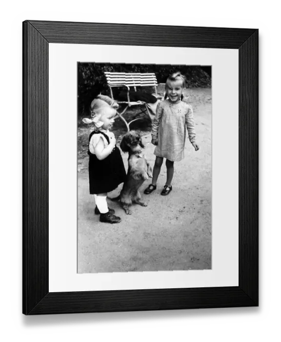 Framed Print : 2 girls with dog (Dackel), ca. 1955 Framed Print : 2 girls with dog (Dackel), ca. 1955