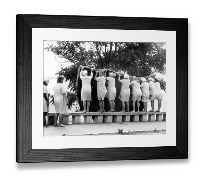Framed Print : Ten women clean carpet approx. 1955