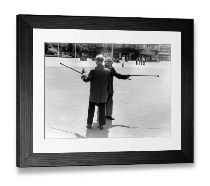 Framed Print : Grandpas with sticks, ca. 1980s Framed Print : Grandpas with sticks, ca. 1980s