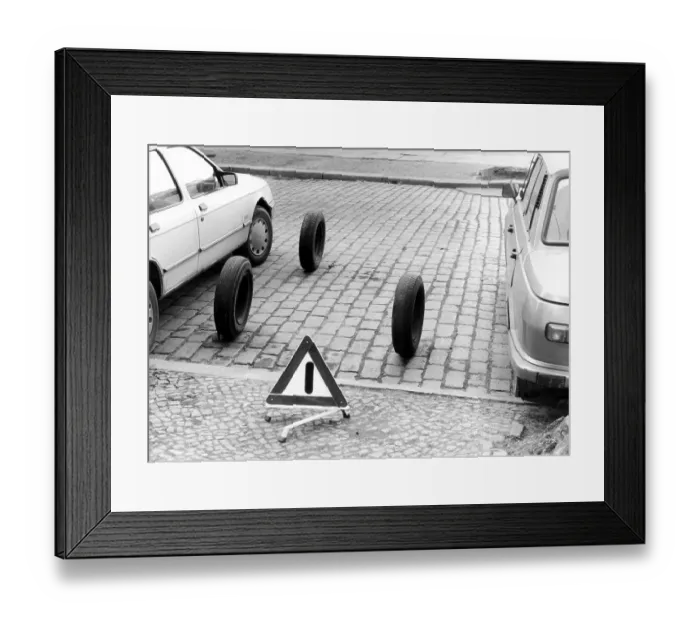 Framed Print : Tyres on parking lot, approx. 1980s