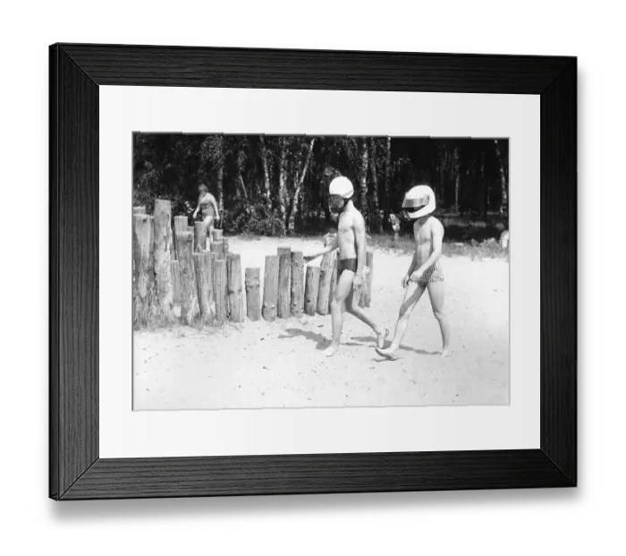 Framed Print : 2 with motorcycle helmet on the beach