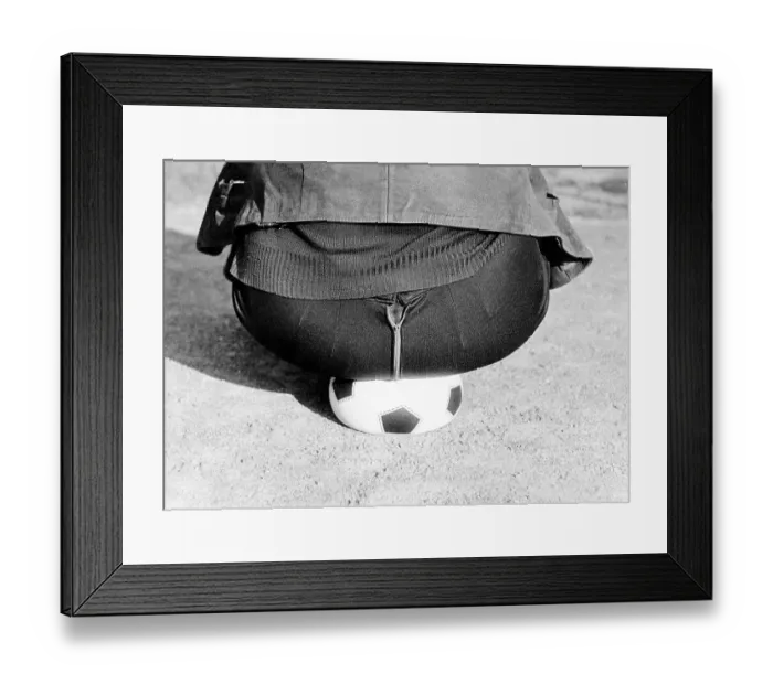 Framed Print : Fat man sits on soccer ball, ca