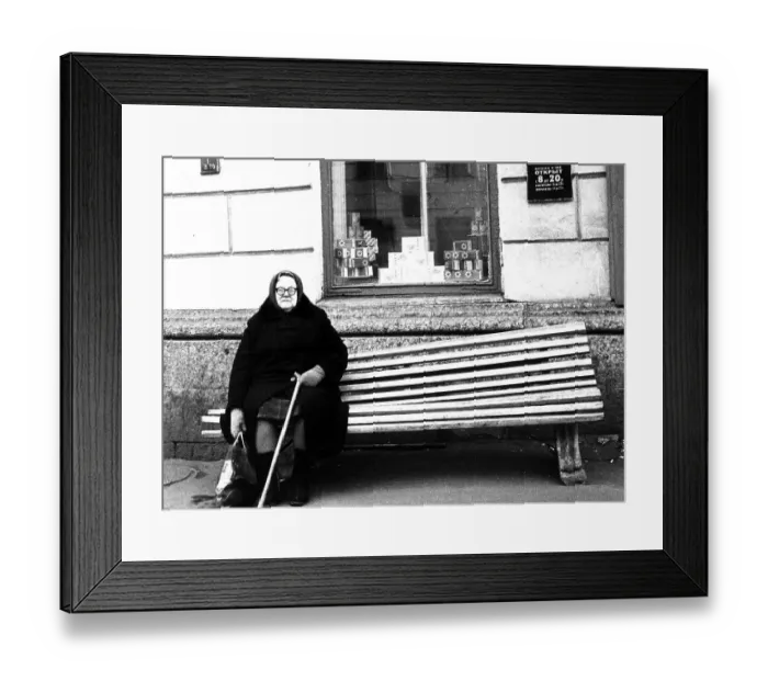 Framed Print : Heavy grandmother sits on the bench