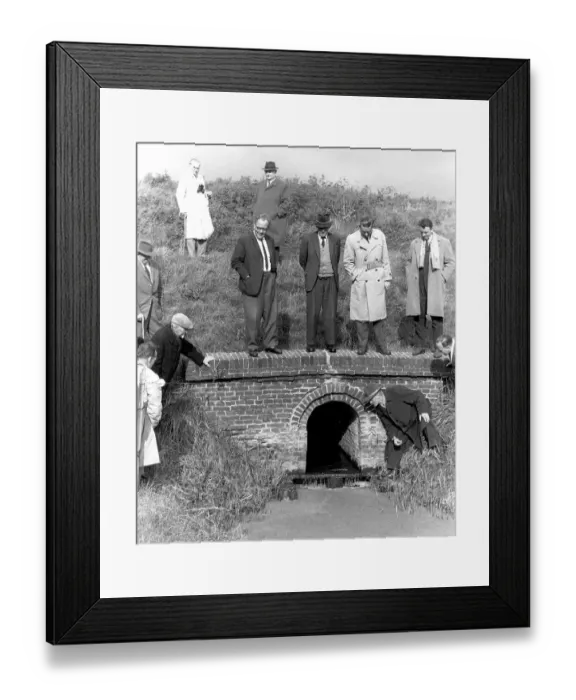 Framed Print : Men looking for something in a creek Framed Print : Men looking for something in a creek
