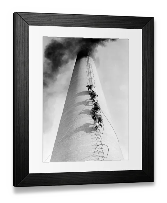 Framed Print : Four men climb up a chimney in a row