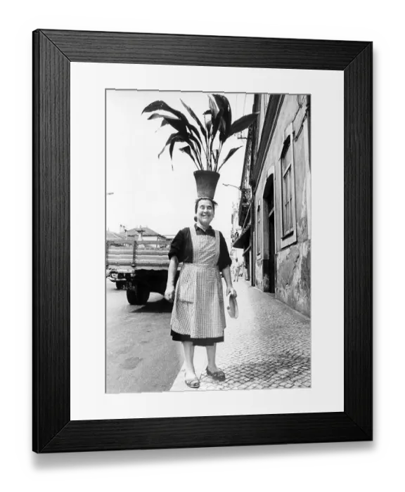 Framed Print : Woman wears flowerpot on her head, ca Framed Print : Woman wears flowerpot on her head, ca