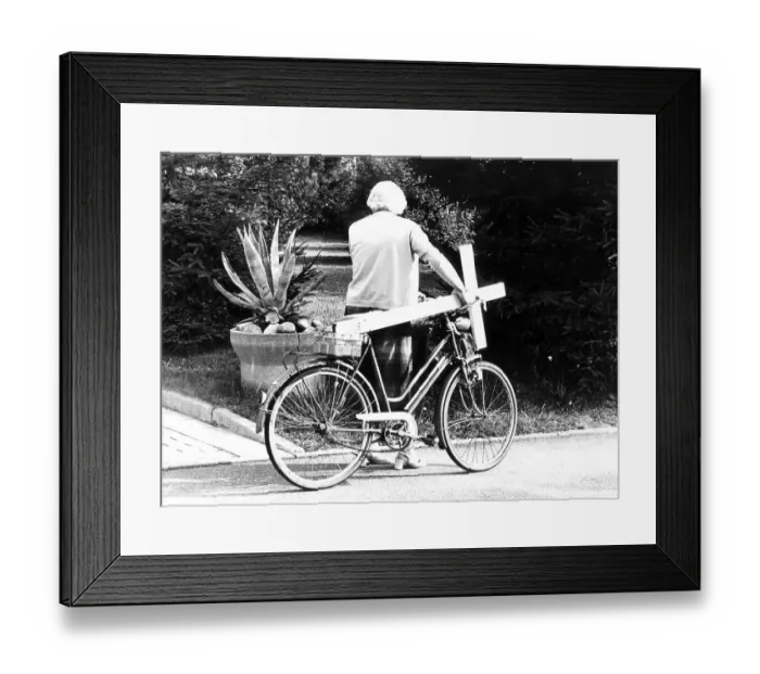 Framed Print : Grandma with cross on bicycle, ca Framed Print : Grandma with cross on bicycle, ca