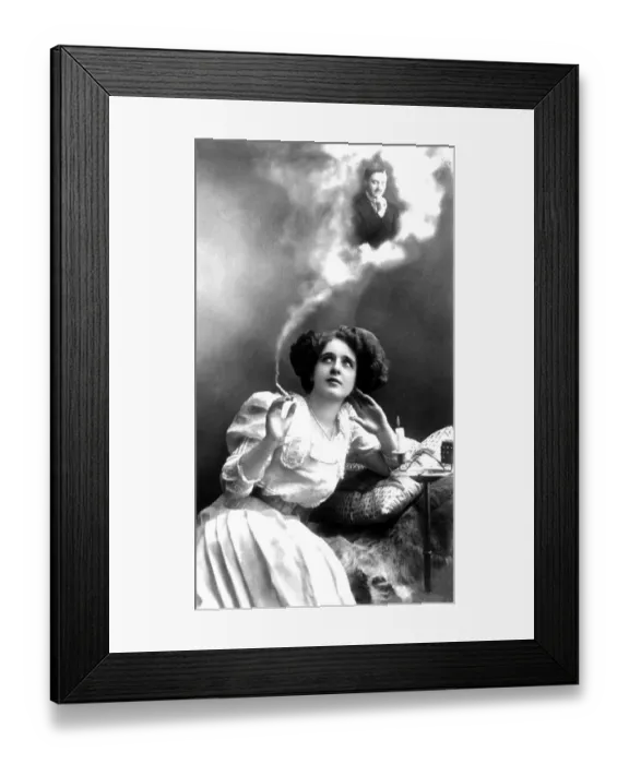 Framed Print : Couple, early montage, woman smokes and beloved man appears in cigarette smoke