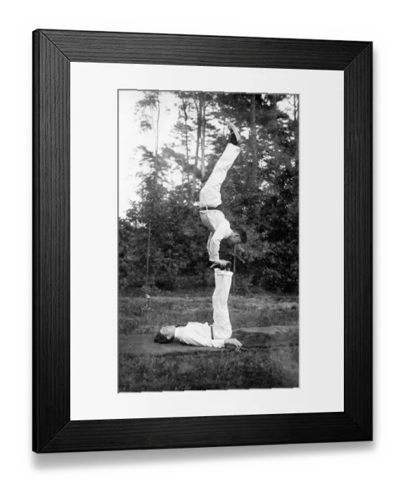 Framed Print : Two acrobats training on the meadow Framed Print : Two acrobats training on the meadow