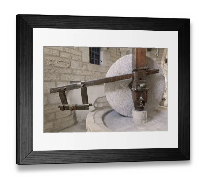 Framed Print : Olive oil stone grinding mill wheel